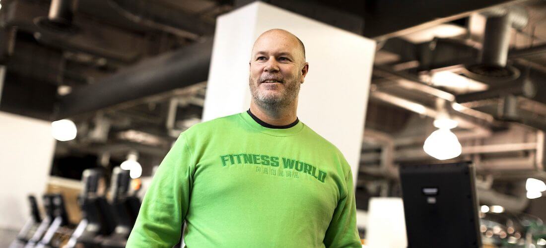 Image of man in green sweatshirt