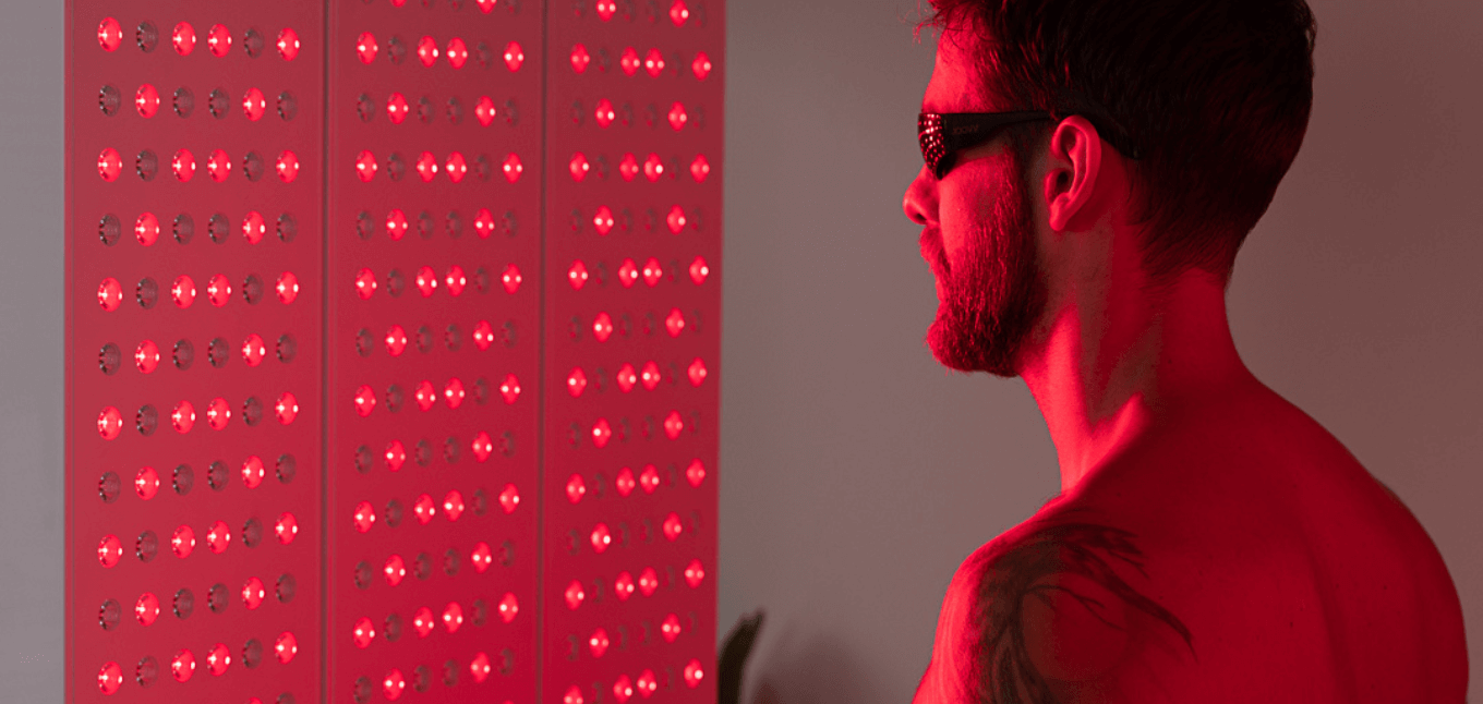 member using HydroMassage and recovery tools at Fitness World