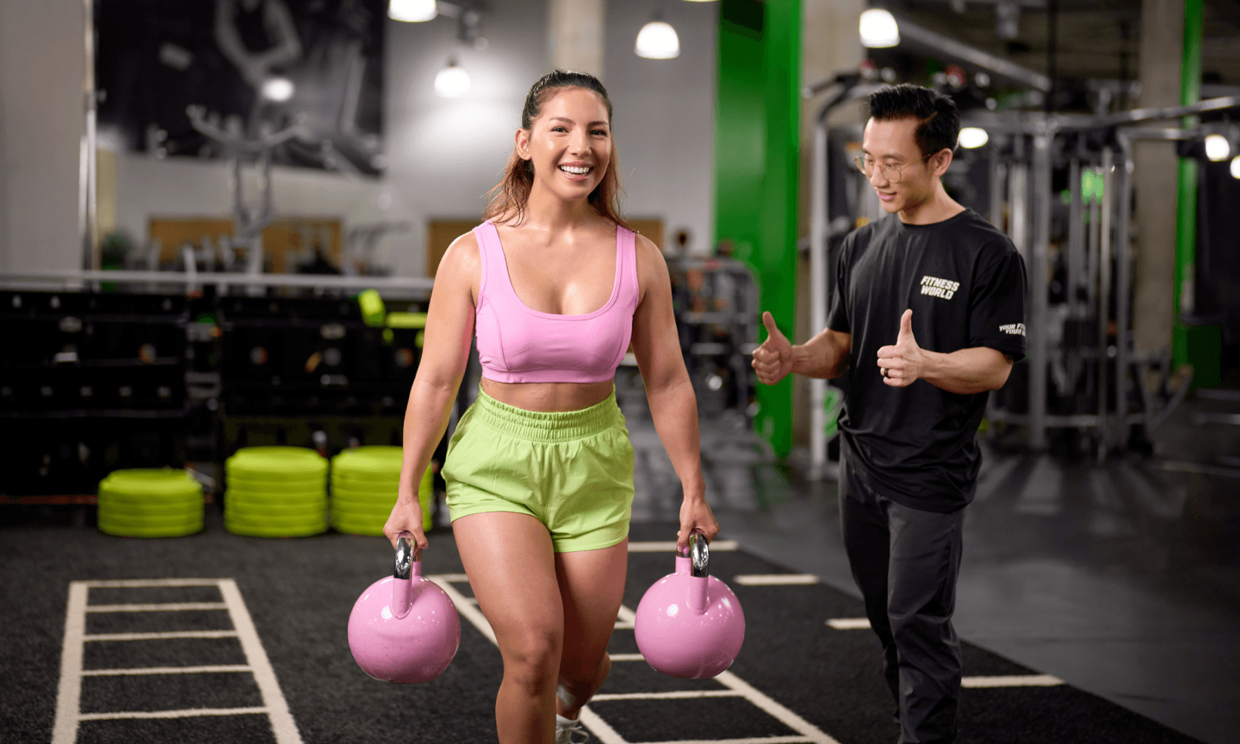 Girl working out with trainer for fitness