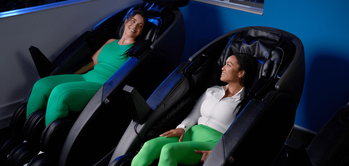 Women using hydromassage chairs for fitness recovery